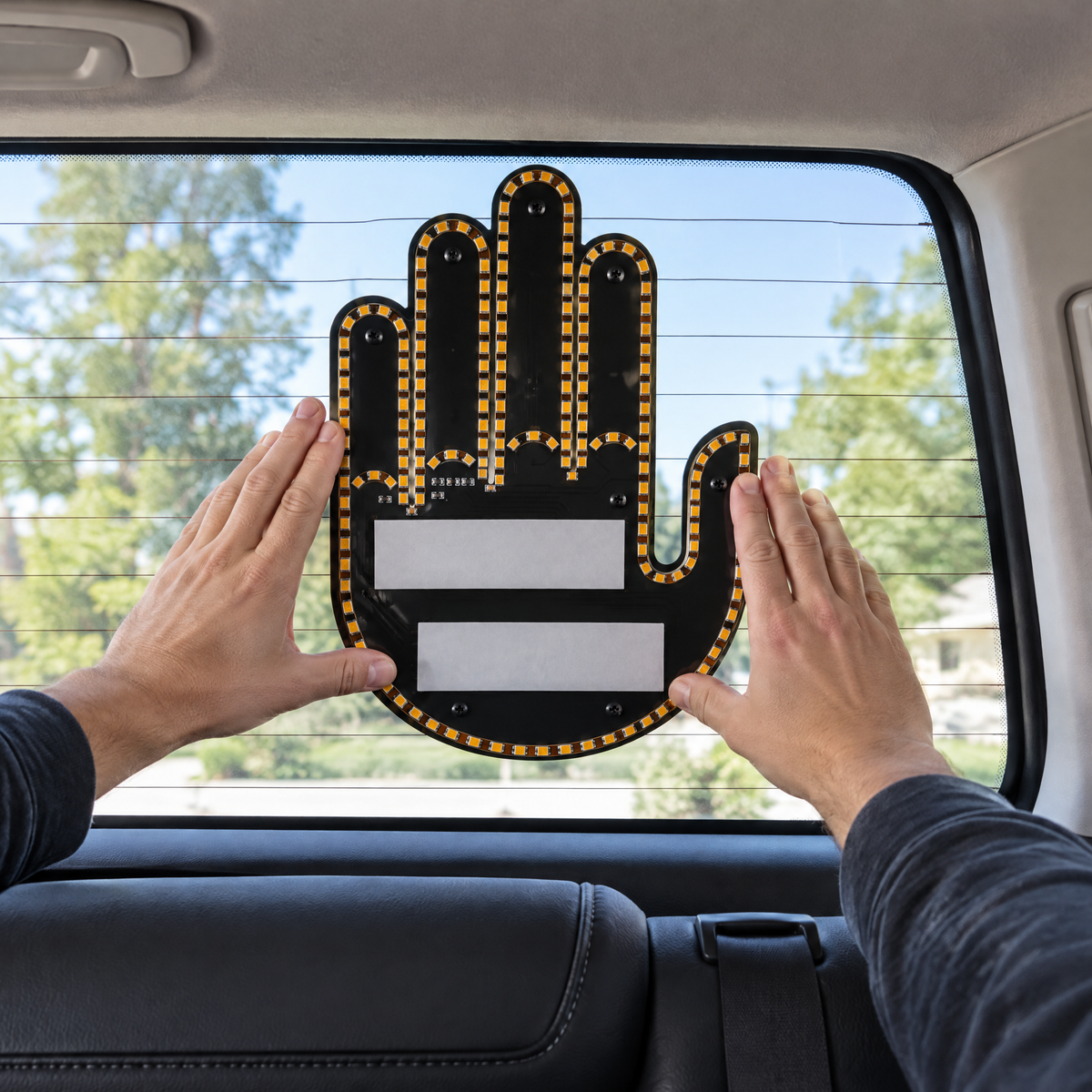 Mounting the hand sign on the inside of a rear window